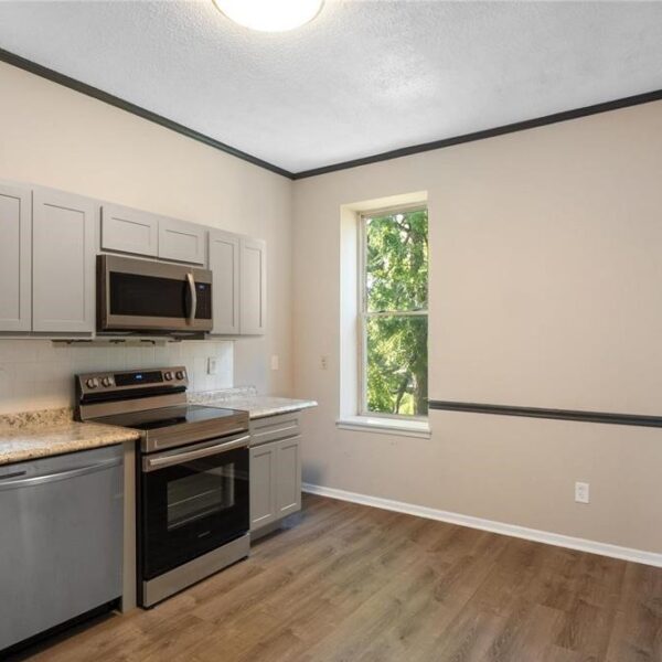 594900 | 4358 Vista Avenue, St. Louis, MO 631104358 Vista kitchen with stainless steel appliances and dark wall trim