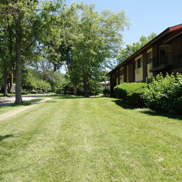 455000 | 7499 Hazelcrest Dr, Hazelwood, MO 63042Hazelcrest condos exterior of one of the buildings with large grassy area