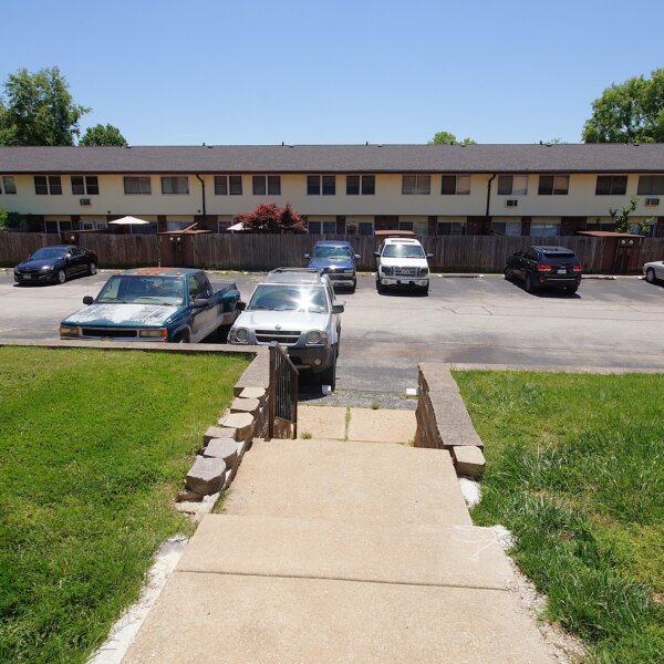 455000 | 7499 Hazelcrest Dr, Hazelwood, MO 63042Hazelcrest condos exterior of one of the buildings showing ample parking