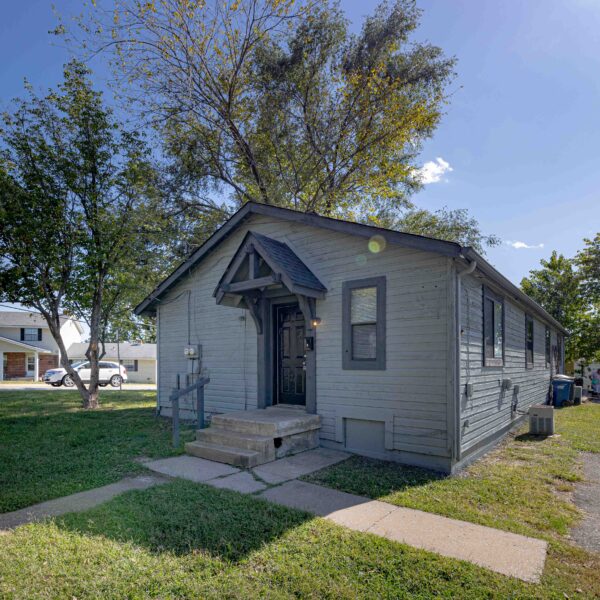 803 Nathan painted gray building exterior for one of the units