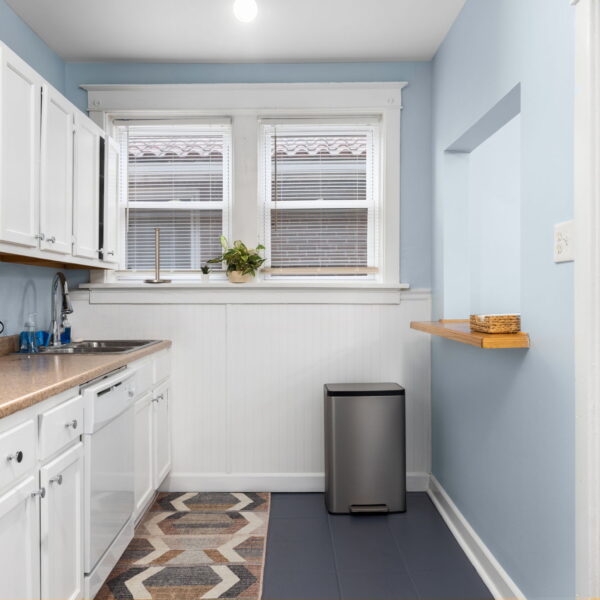 875000 | 4526-4528 Cleveland Ave, St Louis, Missouri 631104526 Cleveland kitchen with two windows on the far wall and a lookout to the dining room on the right