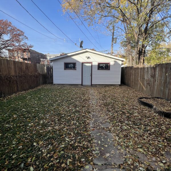 189000 | 3735 Virginia Ave, St Louis, Missouri 631183735 Virginia backyard with sidewalk leading up to the garage