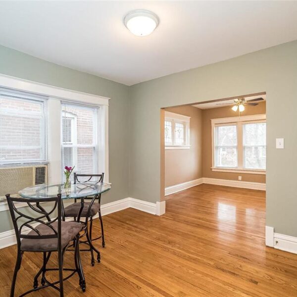 519000 | 2009 Maury Ave., St. Louis, MO 631102009 Maury dining room area with sage green walls and a view into the living room