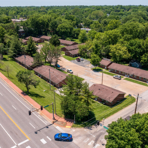 3200000 | 1-13 Marvin Gardens, St. Louis, MO 63114Marvin Gardens Apartments drone photo of the roads around the complex and the street entrance