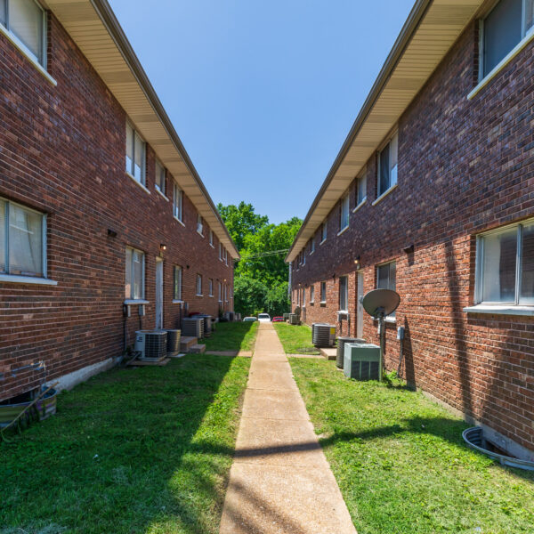 4000000 | 9921 Sloane Sq., Woodson Terrace, MO 63134Timber Place Apartments one of the sidewalk between several of the buildings