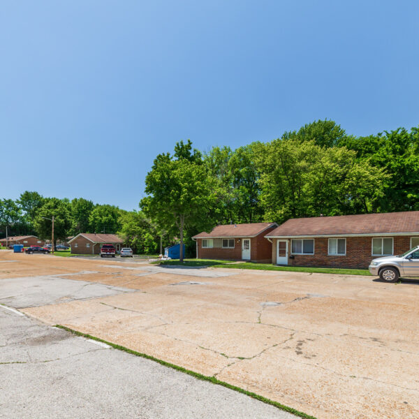 3200000 | 1-13 Marvin Gardens, St. Louis, MO 63114Marvin Gardens Apartments showing one of the buildings and the drive and parking