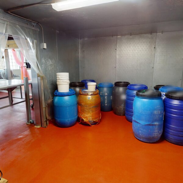 1450000 | 2201 Edwards St., St. Louis, MO 631102201 Edwards Cooler with orange floor, metal walls, and blue barrels