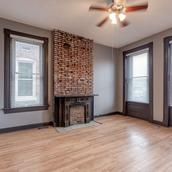 699000 | 1133-1135 Talmage Ave., St. Louis, MO 631101133-1135 Talmage living room area with decorative fireplace on the far wall