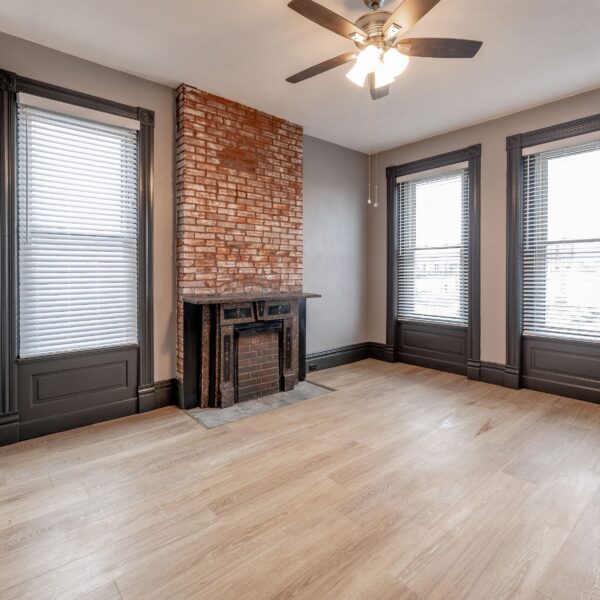 699000 | 1133-1135 Talmage Ave., St. Louis, MO 631101133-1135 Talmage  interior room with a lot of natural light from several windows and a decorative fireplace