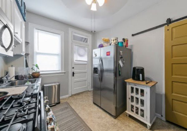 629000 | 4260 Castleman Ave., St. Louis, MO 631104260 Castleman updated kitchen with view of the fridge and back door