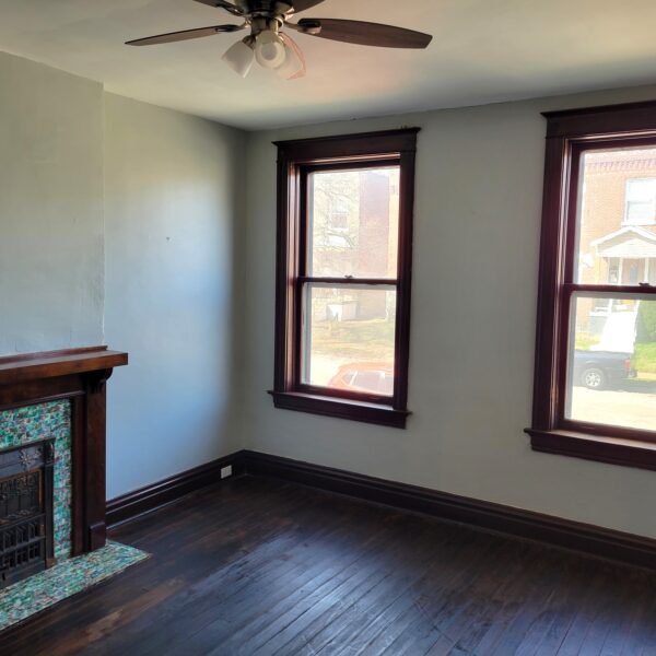 379000 | 3330 Virginia Ave., St. Louis, MO 631183330 Virginia living room area with two windows and a fireplace