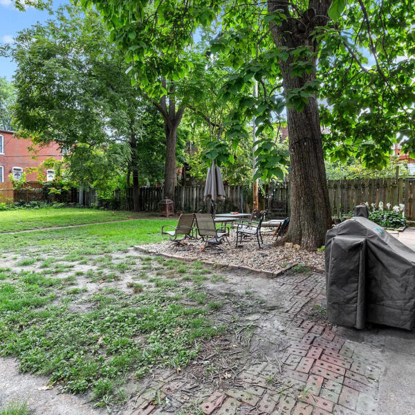 629000 | 4260 Castleman Ave., St. Louis, MO 631104260 Castleman backyard with various patio furniture and a covered grill