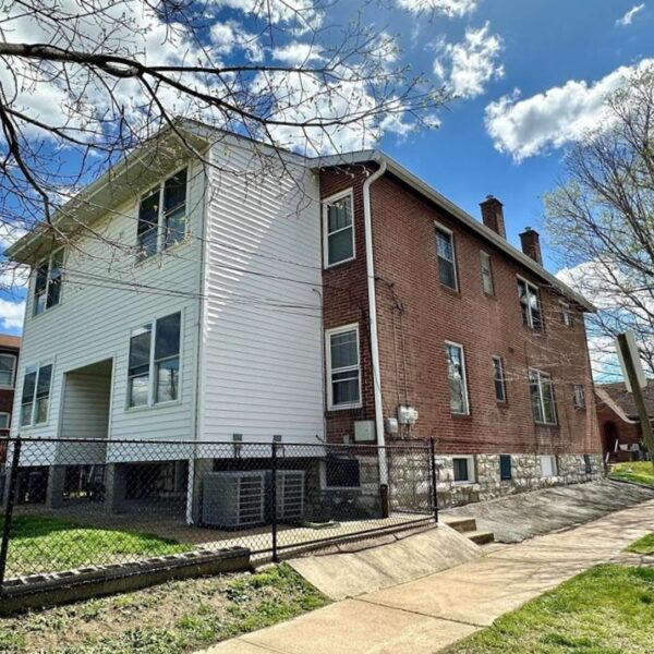 695000 | 5537 Holly Hills Ave., St. Louis, MO 631095537 Holly Hills back and side exterior of the building with sidewalk along the right side