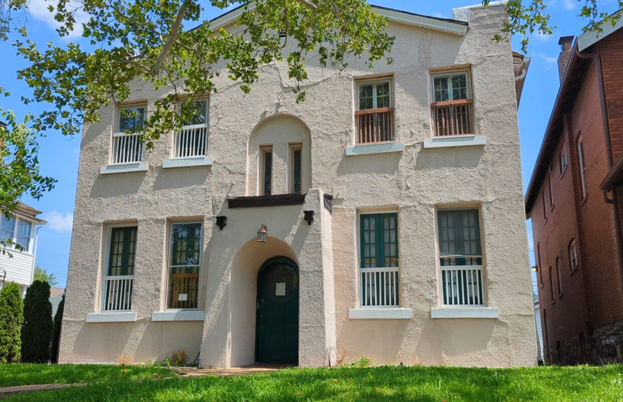 6134 S Grand front stucco Exterior on a sunny day