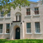 6134 S Grand front stucco Exterior on a sunny day