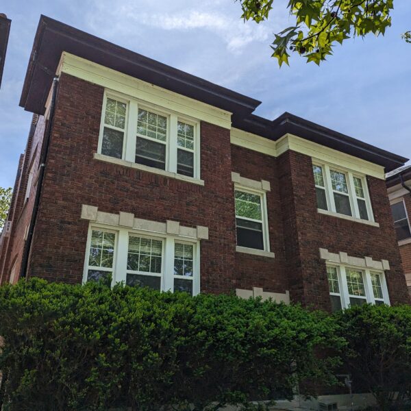 875000 | 6432 Alamo Ave., St Louis, MO 631056432 Alamo front of brick two story building at an angle with bushes lining the building