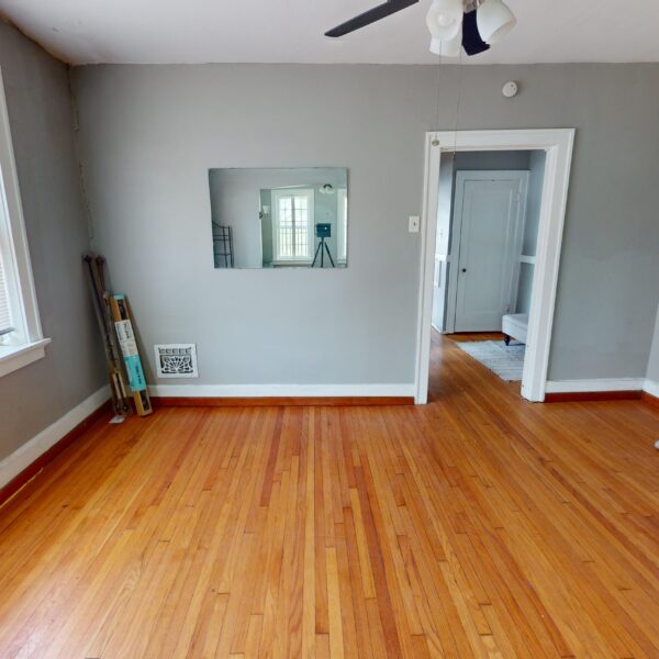 335000 | 6134 S. Grand Blvd., St. Louis, MO 631116134 S Grand - Dining Room with doorway on the right side of the wall and a mirror on the wall to the left