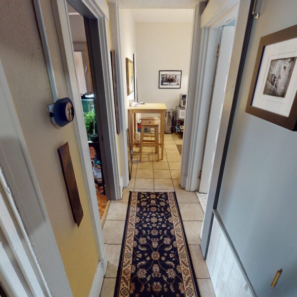 750000 | 3890 Juniata St., St. Louis, MO 631163890 Juniata hallway showing the kitchen entrance at the far end