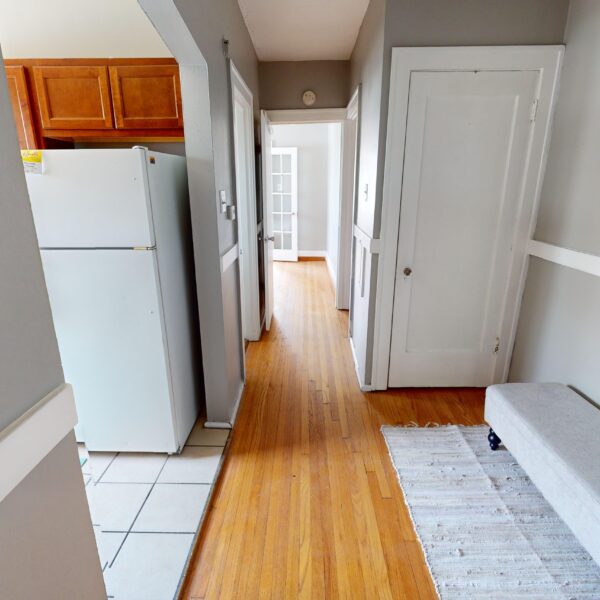 335000 | 6134 S. Grand Blvd., St. Louis, MO 631116134 S Grand Hallway to the bedroom with the kitchen on the left and a closet on the right