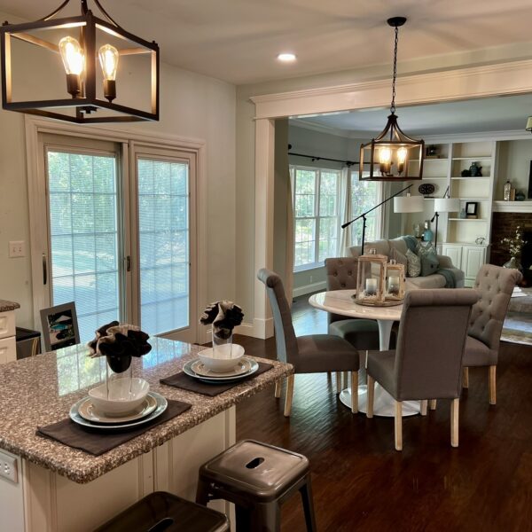 695000 | 1034 Huthmaker Ave, Kirkwood, Missouri 631221034 Huthmaker main level from the kitchen showing the eat-in dining area and sliding doors