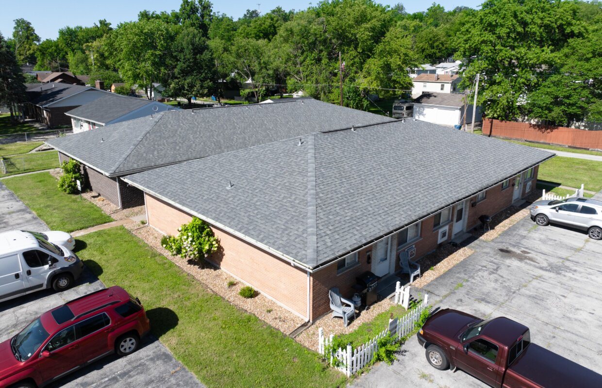 2225 North 4th exterior close up drone shot with asphalt parking lining the buildings