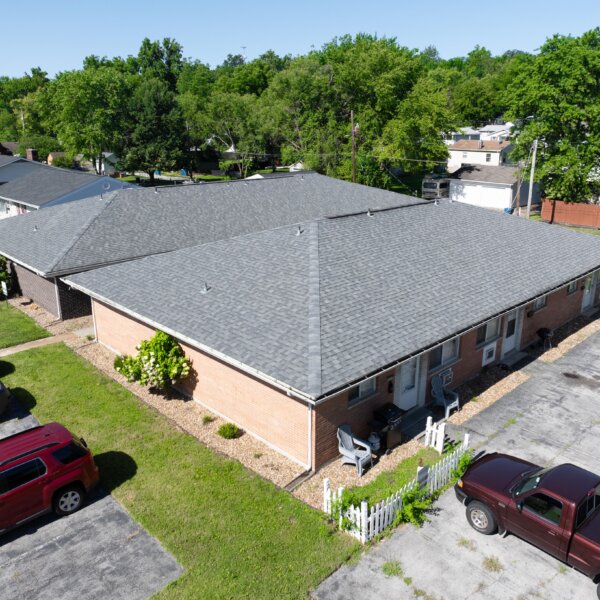 850000 | 2225 North 4th St., St. Charles, MO 633012225 North 4th exterior close up drone shot with asphalt parking lining the buildings