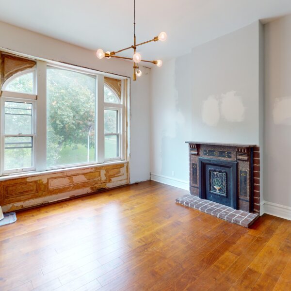 130000 | 2210A Wyoming St., St. Louis, MO 631182210A Wyoming living room area from the corner of the room with a good view of the fireplace and large window