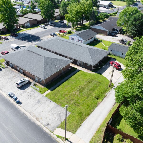 850000 | 2225 North 4th St., St. Charles, MO 633012225 North 4th exterior drone shot from further out with trees across the road on the right