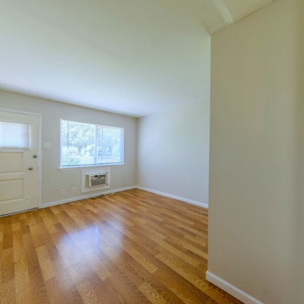 850000 | 2225 North 4th St., St. Charles, MO 633012225 North 4th living room area from the dining area entryway with entry on left and wall AC on the right under the window