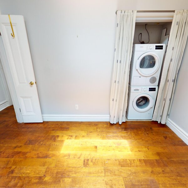 130000 | 2210A Wyoming St., St. Louis, MO 631182210A Wyoming stacked washer and dryer in a closet to the right in the downstairs bedroom