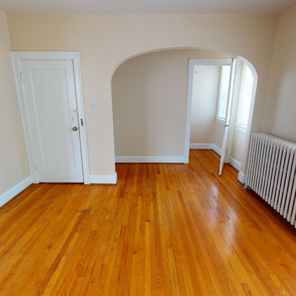 299000 | 7118 Amherst Ave., University City, MO 631307118 Amherst living room area showing the front entry door on the left and an opening toward the walk in closet to the right