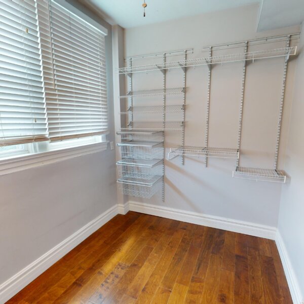 130000 | 2210A Wyoming St., St. Louis, MO 631182210A Wyoming large walk-in closet with shelving and a window on the left