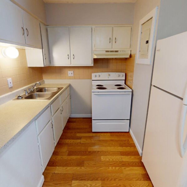 850000 | 2225 North 4th St., St. Charles, MO 633012225 North 4th kitchen area with fridge on the right and stove on the far wall