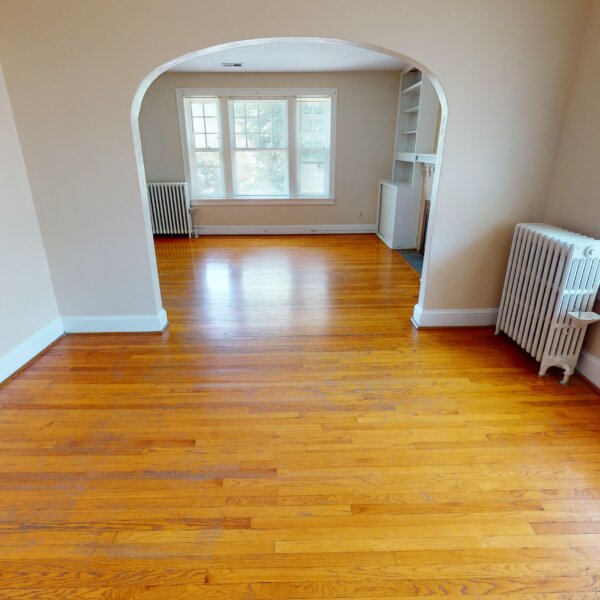 299000 | 7118 Amherst Ave., University City, MO 631307118 Amherst formal dining room area with a shot through the opening to the living room area