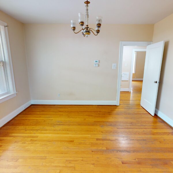 299000 | 7118 Amherst Ave., University City, MO 631307118 Amherst formal dining room with the doorway to the hall on righthand side of the far wall