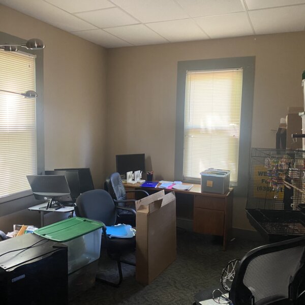 250000 | 901 1st Capitol Dr, St Charles, MO 63301901 1st Capitol office space being used as extra storage with various desks and office supplies