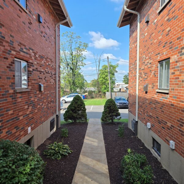 1650000 | 3537-3541 Morganford Road, St. Louis, Missouri 631163537-3541 Morgan Ford sidewalk and landscaping between two apartment buildings