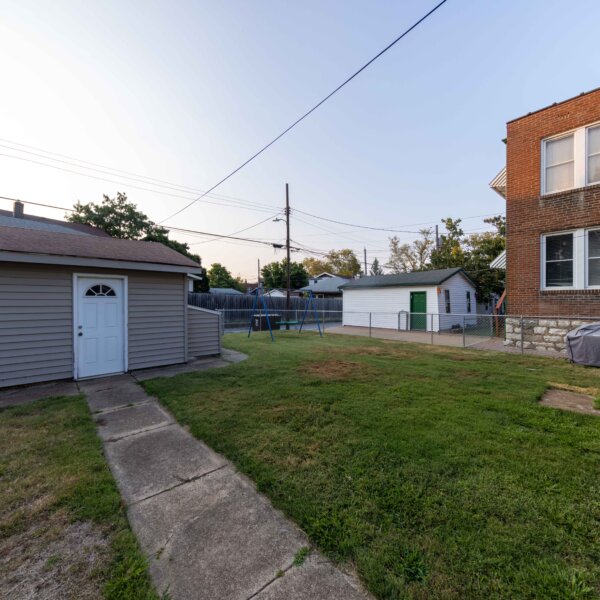 265000 | 5923 South Kingshighway Blvd, St Louis, Missouri 631095923 S Kingshighway view of the garage, the yard, and the back exterior of the building